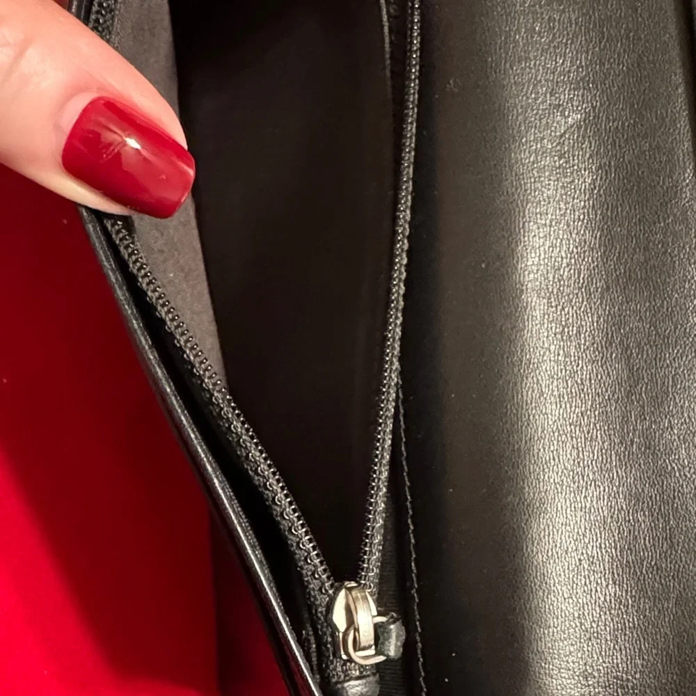 CHANEL Black Leather Wallet with Silver Logo